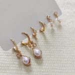 Imagem ilustrativa sobre trio de brincos mostrando três pares de brincos de modelos varidos.